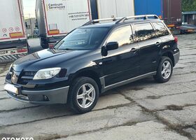 Мицубиси Аутлендер 2005 в Европе на Automoto.ua Черный Мицубиси Аутлендер, объемом двигателя 1 л и пробегом 227 тыс. км за 15900 $, фото 3 на Automoto.ua