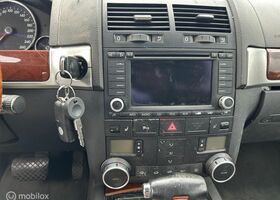 Фольксваген Туарег 2004 у Європі на Automoto.ua Сірий Фольксваген Туарег, об'ємом двигуна 3.19 л та пробігом 282 тис. км за 4113 $, фото 5 на Automoto.ua