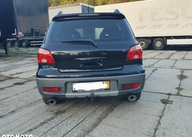 Мицубиси Аутлендер 2005 в Европе на Automoto.ua Черный Мицубиси Аутлендер, объемом двигателя 1 л и пробегом 227 тыс. км за 15900 $, фото 7 на Automoto.ua