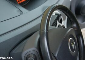 Рено Модус 2009 в Европе на Automoto.ua Белый Рено Модус, объемом двигателя 1 л и пробегом 171 тыс. км за 12800 $, фото 35 на Automoto.ua