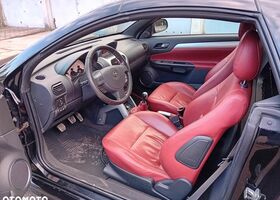 Опель Тигра 2008 в Европе на Automoto.ua Черный Опель Тигра, объемом двигателя 1 л и пробегом 226 тыс. км за 17500 $, фото 12 на Automoto.ua