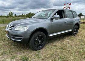 Фольксваген Туарег 2004 у Європі на Automoto.ua Сірий Фольксваген Туарег, об'ємом двигуна 3.19 л та пробігом 282 тис. км за 4113 $, фото 14 на Automoto.ua