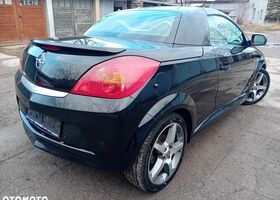Опель Тигра 2008 в Европе на Automoto.ua Черный Опель Тигра, объемом двигателя 1 л и пробегом 226 тыс. км за 17500 $, фото 7 на Automoto.ua