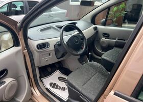 Рено Модус 2005 в Европе на Automoto.ua Бежевый Рено Модус, объемом двигателя 1.15 л и пробегом 145 тыс. км за 2902 $, фото 9 на Automoto.ua