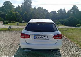 Мерседес Ц-Клас 2014 у Європі на Automoto.ua Білий Мерседес Ц-Клас, об'ємом двигуна 2.14 л та пробігом 210 тис. км за 13076 $, фото 5 на Automoto.ua