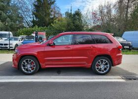 Червоний Джип Grand Cherokee, об'ємом двигуна 6.42 л та пробігом 47 тис. км за 68393 $, фото 5 на Automoto.ua