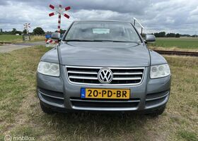 Фольксваген Туарег 2004 у Європі на Automoto.ua Сірий Фольксваген Туарег, об'ємом двигуна 3.19 л та пробігом 282 тис. км за 4113 $, фото 10 на Automoto.ua