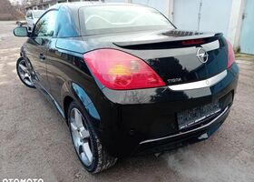 Опель Тигра 2008 в Европе на Automoto.ua Черный Опель Тигра, объемом двигателя 1 л и пробегом 226 тыс. км за 17500 $, фото 4 на Automoto.ua