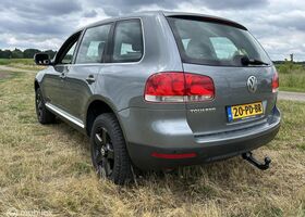 Фольксваген Туарег 2004 у Європі на Automoto.ua Сірий Фольксваген Туарег, об'ємом двигуна 3.19 л та пробігом 282 тис. км за 4113 $, фото 3 на Automoto.ua