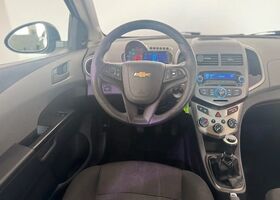 Шевроле Авео 2013 в Европе на Automoto.ua Черный Шевроле Авео, объемом двигателя 1.23 л и пробегом 129 тыс. км за 5587 $, фото 3 на Automoto.ua