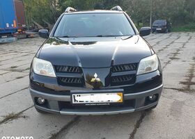 Мицубиси Аутлендер 2005 в Европе на Automoto.ua Черный Мицубиси Аутлендер, объемом двигателя 1 л и пробегом 227 тыс. км за 15900 $, фото 22 на Automoto.ua