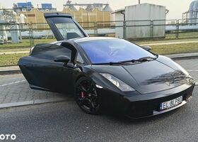 Ламборджини Галлардо 2006 в Европе на Automoto.ua Черный Ламборджини Галлардо, объемом двигателя 4.96 л и пробегом 119 тыс. км за 399000 $, фото 27 на Automoto.ua