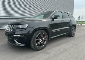 Чорний Джип Grand Cherokee, об'ємом двигуна 6.42 л та пробігом 165 тис. км за 39903 $, фото 1 на Automoto.ua