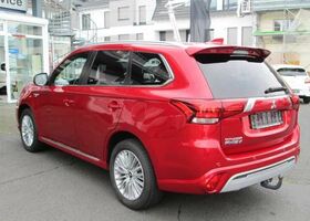 Червоний Міцубісі Outlander PHEV, об'ємом двигуна 2.36 л та пробігом 91 тис. км за 29528 $, фото 6 на Automoto.ua