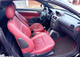 Опель Тигра 2008 в Европе на Automoto.ua Черный Опель Тигра, объемом двигателя 1 л и пробегом 226 тыс. км за 17500 $, фото 10 на Automoto.ua