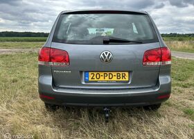 Фольксваген Туарег 2004 у Європі на Automoto.ua Сірий Фольксваген Туарег, об'ємом двигуна 3.19 л та пробігом 282 тис. км за 4113 $, фото 11 на Automoto.ua