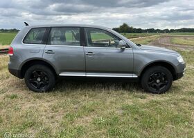 Фольксваген Туарег 2004 у Європі на Automoto.ua Сірий Фольксваген Туарег, об'ємом двигуна 3.19 л та пробігом 282 тис. км за 4113 $, фото 7 на Automoto.ua