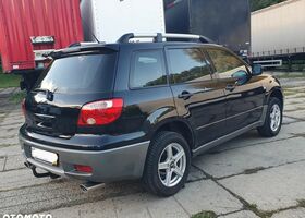 Мицубиси Аутлендер 2005 в Европе на Automoto.ua Черный Мицубиси Аутлендер, объемом двигателя 1 л и пробегом 227 тыс. км за 15900 $, фото 5 на Automoto.ua