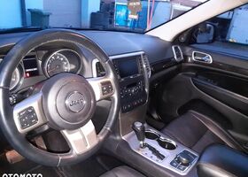 Джип Grand Cherokee, об'ємом двигуна 5.65 л та пробігом 286 тис. км за 14471 $, фото 5 на Automoto.ua