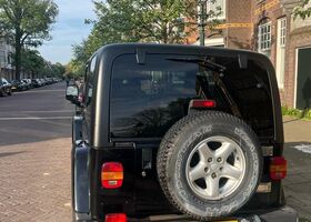 Чорний Джип Wrangler, об'ємом двигуна 3.96 л та пробігом 164 тис. км за 18359 $, фото 4 на Automoto.ua