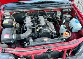 Червоний Сузукі Джімні, об'ємом двигуна 1.3 л та пробігом 187 тис. км за 7058 $, фото 3 на Automoto.ua