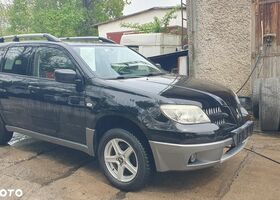 Мицубиси Аутлендер 2005 в Европе на Automoto.ua Черный Мицубиси Аутлендер, объемом двигателя 1 л и пробегом 227 тыс. км за 15900 $, фото 30 на Automoto.ua