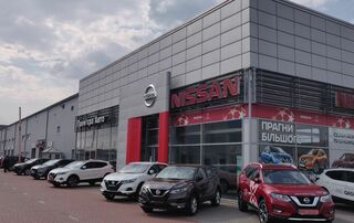 Логотип Прем'єра Nissan