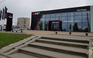 Автосалон Мегакарс Mitsubishi Логотип Мегакарс Mitsubishi