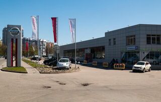 Автосалон Техник Центр Nissan Логотип Техник Центр Nissan