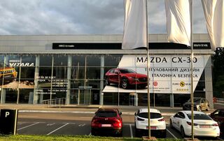 Логотип НІКО Істлайн Мегаполіс Mazda