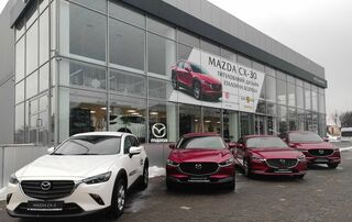 Автосалон Захид Моторс Mazda Логотип Захид Моторс Mazda