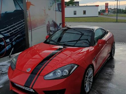 Хендай Купе 2007 в Европе на Automoto.ua Красный Хендай Купе, объемом двигателя 1 л и пробегом 188 тыс. км за 27900 $, фото 1 на Automoto.ua