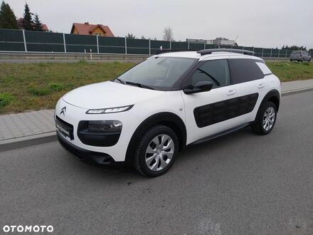 Ситроен C4 Кактус 2015 в Европе на Automoto.ua Белый Ситроен C4 Кактус, объемом двигателя 1 л и пробегом 107 тыс. км за 35000 $, фото 1 на Automoto.ua