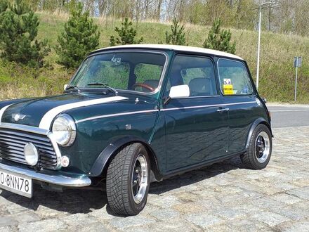 Ровер MINI 1996 в Европе на Automoto.ua Зеленый Ровер MINI, объемом двигателя 1 л и пробегом 47 тыс. км за 11623 $, фото 1 на Automoto.ua