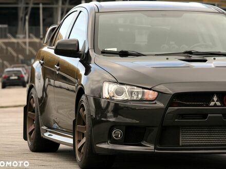 Мицубиси Лансер Эволюшн 2013 в Европе на Automoto.ua Черный Мицубиси Лансер Эволюшн, объемом двигателя 1 л и пробегом 104 тыс. км за 165000 $, фото 1 на Automoto.ua