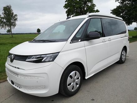 Фольксваген T7 California 2025 в Европе на Automoto.ua Белый Фольксваген T7 California, объемом двигателя 1.97 л и пробегом 10 тыс. км за 65262 $, фото 1 на Automoto.ua