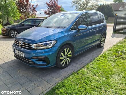 Фольксваген Туран 2018 у Європі на Automoto.ua Синій Фольксваген Туран, об'ємом двигуна 1 л та пробігом 149 тис. км за 19129 $, фото 1 на Automoto.ua