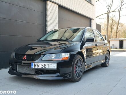 Міцубісі Лансер Еволюшн 2003 у Європі на Automoto.ua Чорний Міцубісі Лансер Еволюшн, об'ємом двигуна 1 л та пробігом 107 тис. км за 129900 $, фото 1 на Automoto.ua