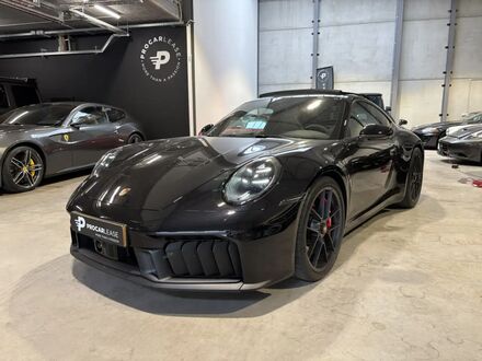 Порше 992 2025 в Европе на Automoto.ua Черный Порше 992, объемом двигателя 3.59 л и пробегом 2 тыс. км за 234668 $, фото 1 на Automoto.ua
