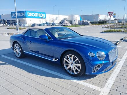 Синій Бентлі Continental GTC, об'ємом двигуна 4 л та пробігом 24 тис. км за 239612 $, фото 1 на Automoto.ua