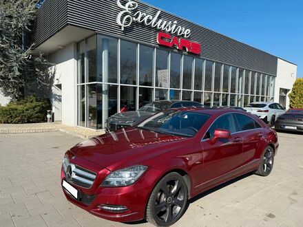 Мерседес ЦЛС 350 2011 у Європі на Automoto.ua Червоний Мерседес ЦЛС 350, об'ємом двигуна 2.99 л та пробігом 150 тис. км за 19363 $, фото 1 на Automoto.ua