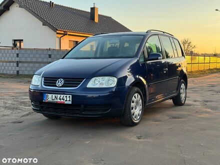 Фольксваген Туран 2004 в Европе на Automoto.ua Синий Фольксваген Туран, объемом двигателя 1 л и пробегом 246 тыс. км за 7700 $, фото 1 на Automoto.ua
