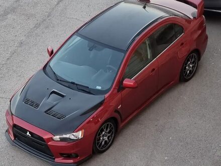 Міцубісі Lancer 2010 у Європі на Automoto.ua Червоний Міцубісі Lancer, об'ємом двигуна 2 л та пробігом 161 тис. км за 44169 $, фото 1 на Automoto.ua