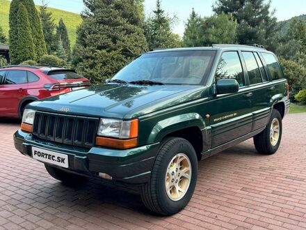 Зелений Джип Grand Cherokee, об'ємом двигуна 5.22 л та пробігом 249 тис. км за 13563 $, фото 1 на Automoto.ua