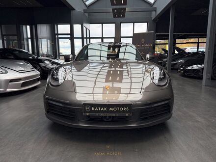 Порше 911 2021 в Европе на Automoto.ua Серый Порше 911, объемом двигателя 2.98 л и пробегом 48 тыс. км за 153604 $, фото 1 на Automoto.ua