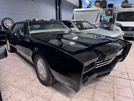 Олдсмобиль Торонадо 1979 в Европе на Automoto.ua Черный Олдсмобиль Торонадо, объемом двигателя 5.7 л и пробегом 125 тыс. км за 10437 $, фото 1 на Automoto.ua