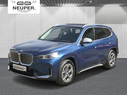 БМВ iX1 2024 в Европе на Automoto.ua Синий БМВ iX1, объемом двигателя 0 л и пробегом 14 тыс. км за 57312 $, фото 1 на Automoto.ua