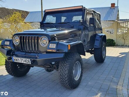 Джип Wrangler 1997 у Європі на Automoto.ua Чорний Джип Wrangler, об'ємом двигуна 2.46 л та пробігом 119 тис. км за 35900 $, фото 1 на Automoto.ua