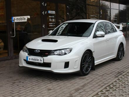 Субару WRX STI 2012 у Європі на Automoto.ua Білий Субару WRX STI, об'ємом двигуна 2.46 л та пробігом 147 тис. км за 31373 $, фото 1 на Automoto.ua