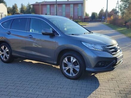 Хонда СРВ 2013 в Европе на Automoto.ua Серый Хонда СРВ, объемом двигателя 2 л и пробегом 140200 тыс. км за 63300 $, фото 1 на Automoto.ua